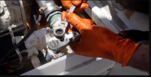 Technician with a socket wrenchs